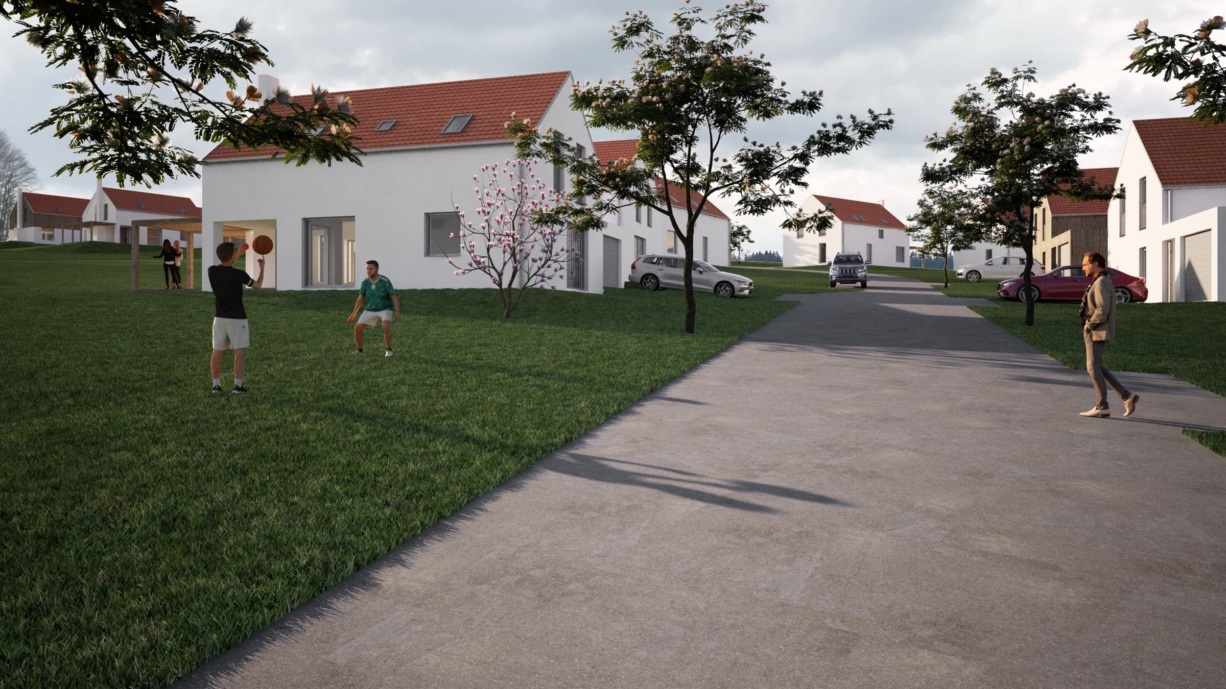 Ulice nové čtvrti s výhledem do krajiny